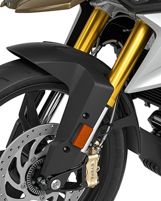 Vemos la horquilla invertida anodizada en oro de la G 310 GS.