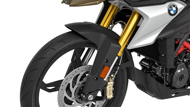 Vemos la horquilla invertida anodizada en oro de la G 310 GS.