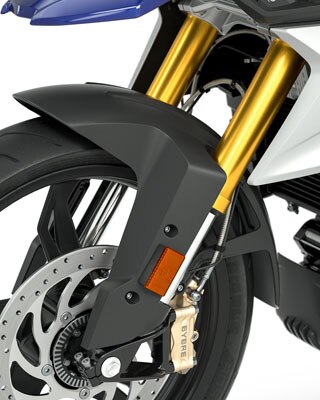 Vemos la horquilla invertida anodizada en oro de la G 310 GS.